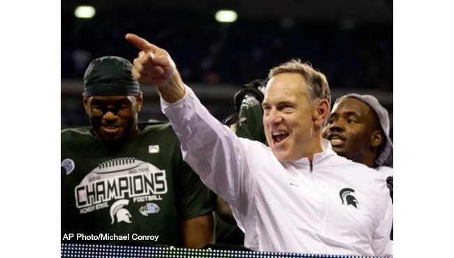 Michigan State coach Mark Dantonio celebrates after Michigan State defeated Iowa 16-13 to win the Big Ten championship NCAA college football game Saturday Dec. 5 2015