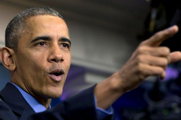 President Barack Obama speaks during a news conference in the Brady Press briefing room at the White House in Washington Friday Dec. 18 2015