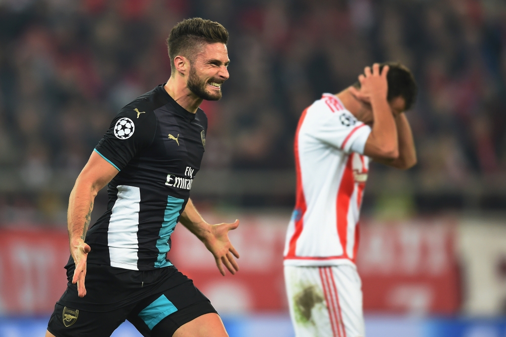 Olivier Giroud was all smiles after his three goals sent Arsenal into the next stage of UEFA Champions League