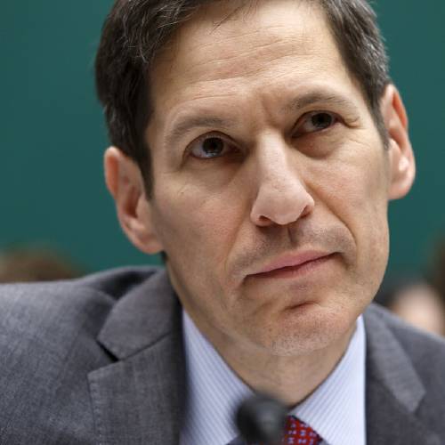 Centers for Disease Control and Prevention Director Dr. Tom Frieden listens as he testifies on Capitol Hill in Washington. A bold federal effort to curb prescribing of painkillers may be faltering