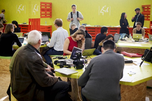 Participants work at the venue of Paris Climate Change Conference at Le Bourget on the northern suburbs of Paris France Dec. 9 2015