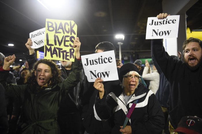 Black Lives Matter protesters chant slogans