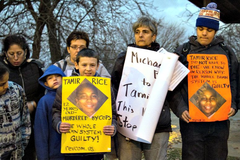 People display sigs at Cudell Commons Park in Cleveland Ohio