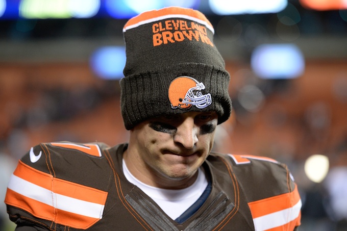 Austin Davis of the Cleveland Browns walks off the field after teams 33-27 loss to the Ravens