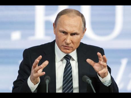 Video AP Russian President Vladimir Putin gestures during his annual news conference in Moscow Russia yesterday