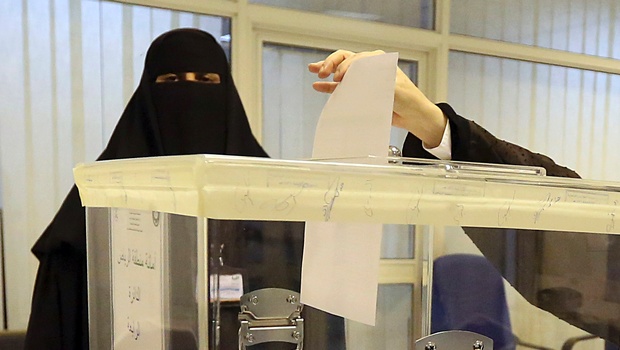 Saudi women vote at a polling center during the municipal elections in Riyadh Saudi Arabia. | AP