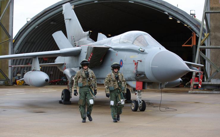 Pilots and ground crew prepared combat aircraft Panavia Tornados at RAF Marham Wednesday in the United Kingdom.                    WPA Pool  Getty Images