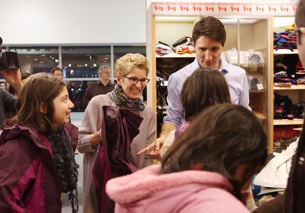 Trudeau And Wynne Greet 1st Plane Load Of Syrian Refugees At Pearson Airport