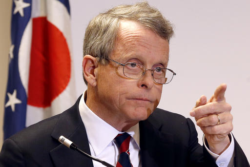 Ohio Attorney General Mike De Wine answers questions during a news conference in Steubenville Ohio Nov. 25 2013