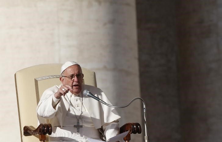 Pope Francis speaks as he leads the weekly audience in Saint Peter's Square in the Vatican