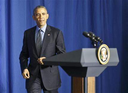 President Barack Obama arrives for a news conference at the Organization for Economic Cooperation and Development in Paris