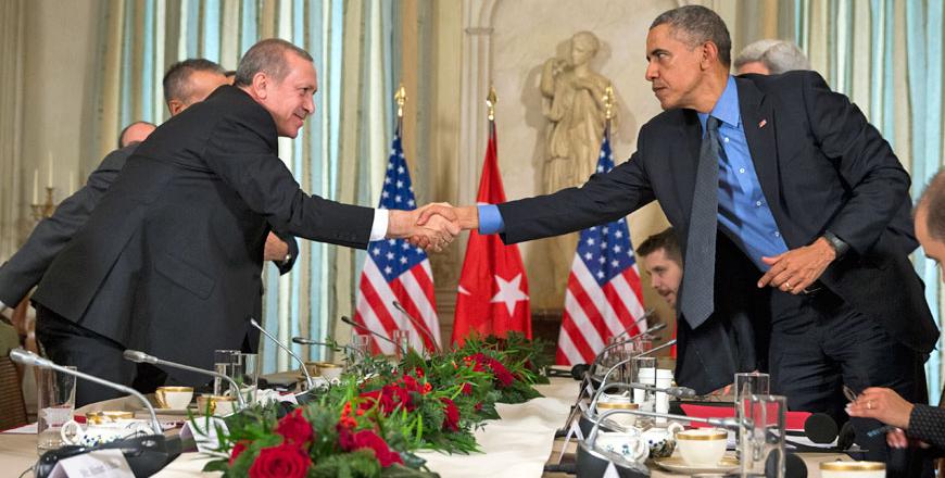 President Barack Obama right shakes hands with Turkish President Recep Tayyip Erdogan after a bilateral meeting in Paris on Tuesday Dec. 1 2015