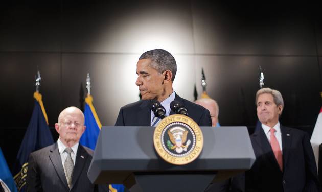 President Barack Obama accompanied by from left Office of National Intelligence Director James Clapper Vice President Joe Biden and Secretary of State John Kerry walks away from the podium after speaking at the National Counterterrorism Center in Mc