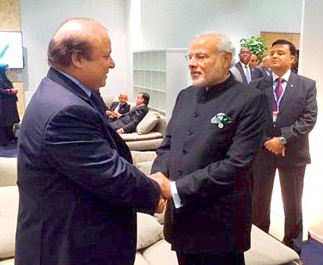 Prime Minister Narendra Modi greets his Pakistani counterpart Nawaz Sharif in Paris on the sidelines of the COP21 Summit on climate change