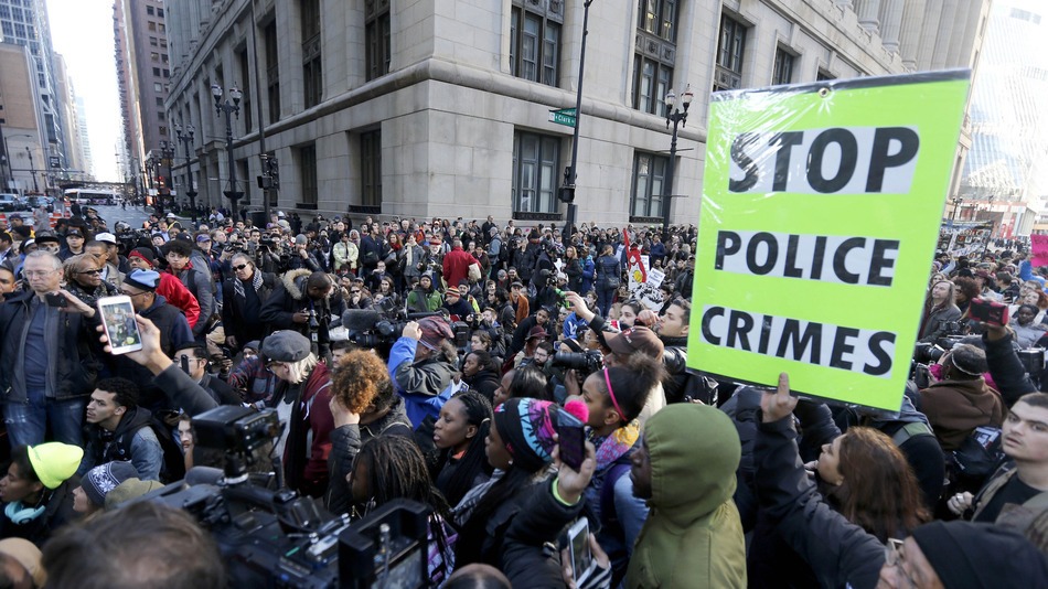 Protesters take to the streets of Chicago to call for the resignation of Mayor Rahm Emanuel