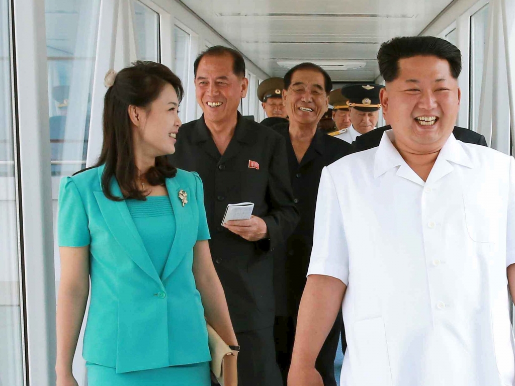 REUTERS  KCNAKim Jong Un sporting the'ambitious hairdo alongside his wife Ri Sol Ju