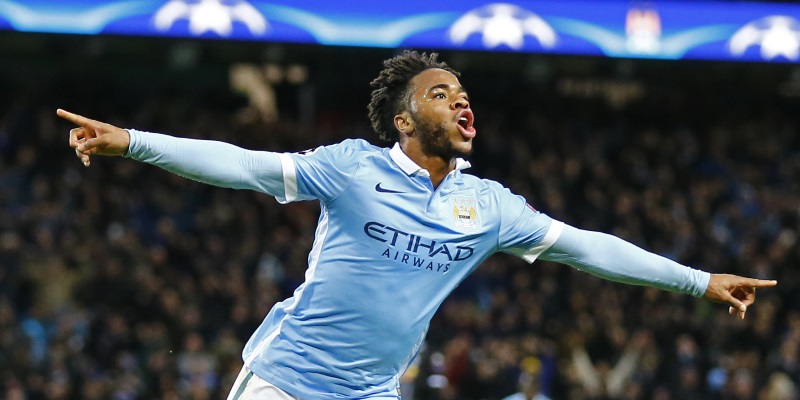 Raheem Sterling celebrates after scoring the third goal for Manchester City