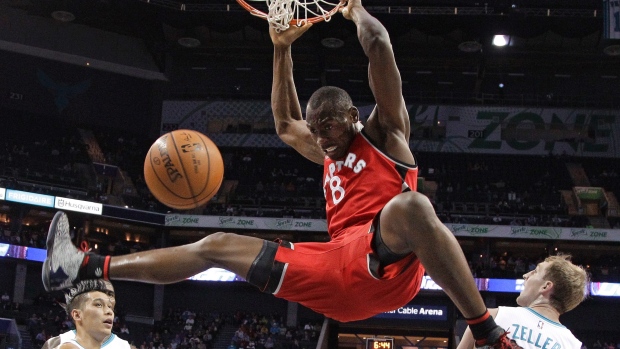 Former Hornet Bismack Biyombo had a big slam for the Raptors in his return to Charlotte and a career-high 18 rebounds but Toronto fell in overtime 109-99