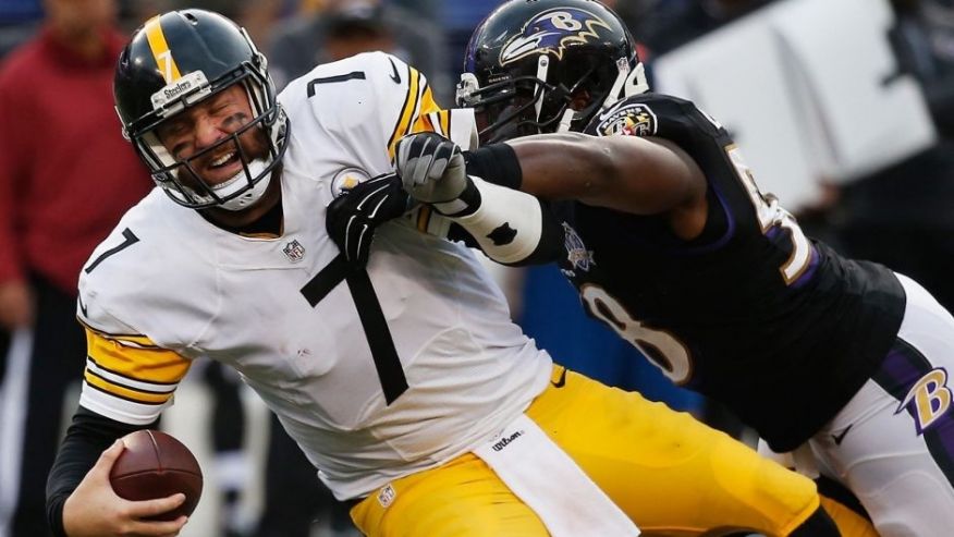 BALTIMORE MD- DECEMBER 27 Ben Roethlisberger #7 of the Pittsburgh Steelers is sacked by Elvis Dumervil #58 of the Baltimore Ravens during the fourth quarter at M&T Bank Stadium