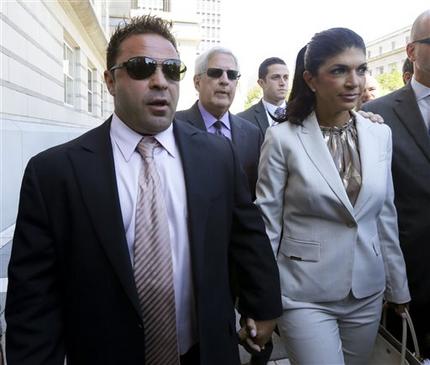 'The Real Housewives of New Jersey stars Giuseppe'Joe Giudice 43 left and his wife Teresa Giudice 41 of Montville Township N.J. walk out of Martin Luther King Jr. Courthouse after an appearance in Newark