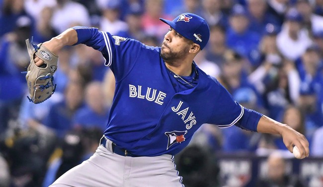 Toronto Blue Jays starting pitcher David Price delivers to the Kansas City Royals during second inning game six American League Championship Series baseball action in Kansas City Mo. on Friday