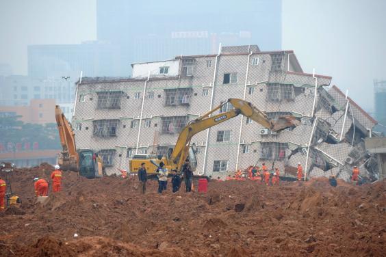 Rescue workers on the site in China