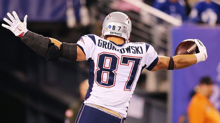 Rob Gronkowski of the New England Patriots celebrates as he scores one of nine touchdowns this season