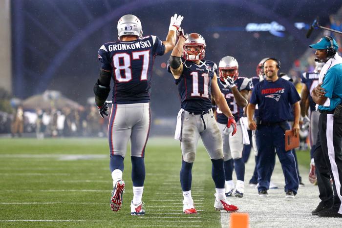 FOXBORO MA- SEPTEMBER 10 Rob Gronkowski #87 of the New England Patriots celebrates his third touchdown of the game with Julian Edelman #11 against the Pittsburgh Steelers at Gillette Stadium