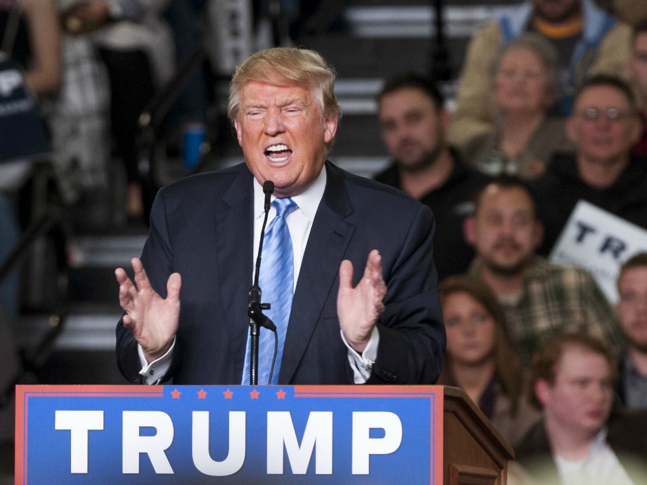 Republican presidential candidate Donald Trump addresses supporters during a campaign rally at the Greater Columbus Convention Center