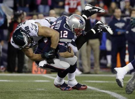 Philadelphia Eagles linebacker Connor Barwin sacks New England Patriots quarterback Tom Brady during the first half of an NFL football game Sunday Dec. 6 2015 in Foxborough Mass. The Eagles beat the Patriots 35-28