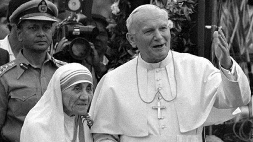 Pope John Paul II with Mother Teresa after visiting the Casa del Cuore Puro Mother Teresa's home for the destitute and dying in the eastern Indian city of Calcutta in this Feb. 3 1986 file