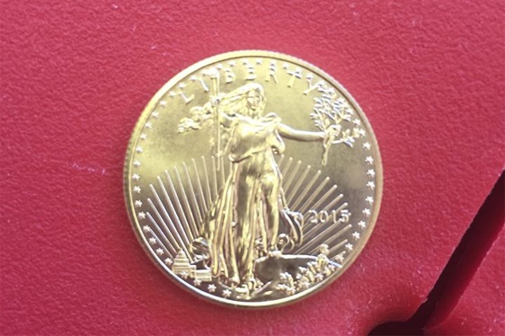 A 2015 American Eagle one-half ounce gold proof coin was dropped into a kettle. The Salvation Army says the coin retails for $720 at the United States mint