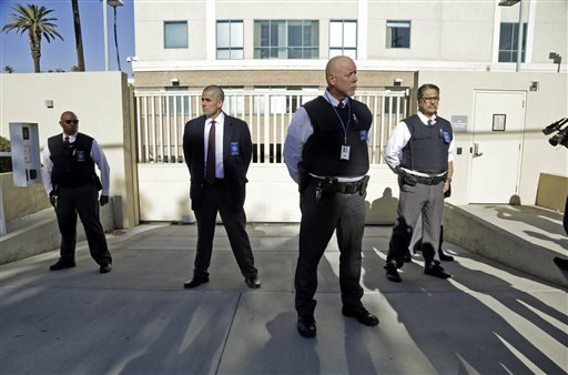 Security is tight after a car carrying Enrique Marquez Jr. arrived at U.S. District Court in Riverside Calif. Thursday Dec. 17 2015. Marquez a longtime friend of Syed Rizwan Farook the male shooter in the San Bernardino terrorist attack was charged