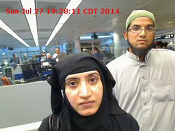 Customs and Border Protection shows Tashfeen Malik left and Syed Farook as they passed through O'Hare International Airport in Chicago. The Obama administration is reviewing procedures for vetting would