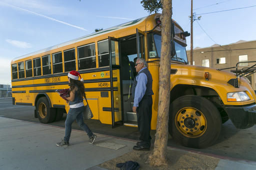 Los Angeles-area students arrive to school at the Edward R. Roybal Learning Center in Los Angeles Wednesday Dec. 16 2015. Students are heading back to class a day after an emailed threat triggered a shutdown of the vast Los Angeles Unified School Distri