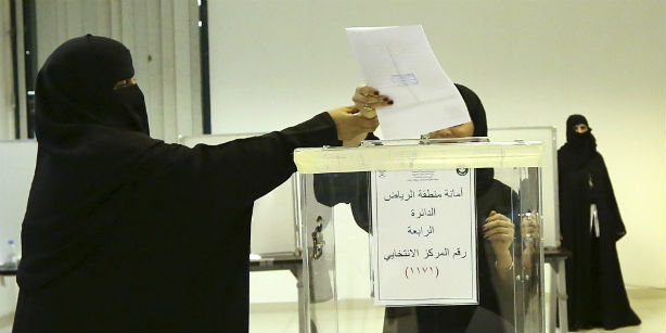 Saudi women vote for the first time in landmark election