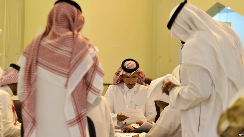 Saudi election officials count votes at the end of the municipal elections on Dec. 12 2015 in the Saudi Red Sea city of Jeddah