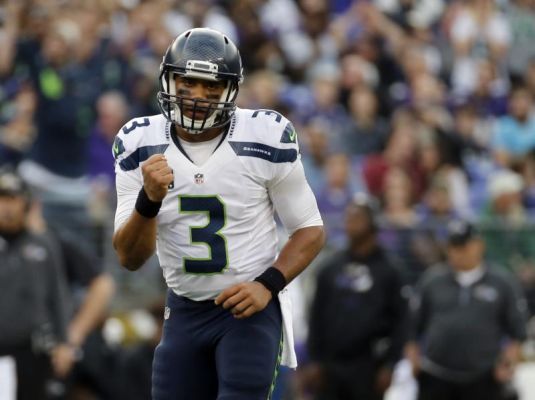 Seattle Seahawks quarterback Russell Wilson celebrates