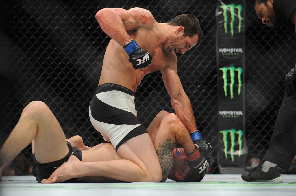 Las Vegas NV USA Luke Rockhold lands punches against Chris Weidman during UFC 194 at MGM Grand Garden Arena. Mandatory Credit Gary A. Vasquez-USA TODAY Sports ORG XMIT USATSI-257072 ORIG FILE ID