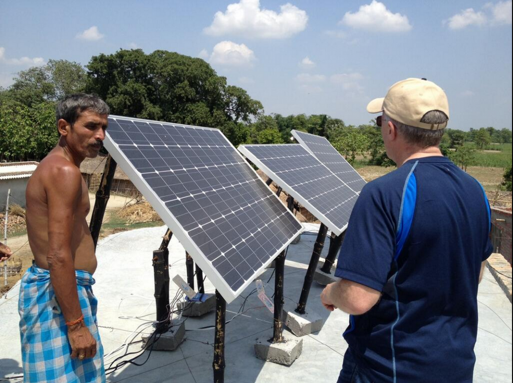 Solar panels in an off-grid Indian village. Image via Wikipedia