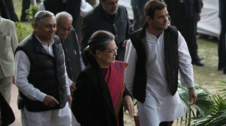 Sonia Gandhi and Rahul Gandhi arrive at the AICC HQ after appearing at the Patial House court in New Delhi o saturday. Express