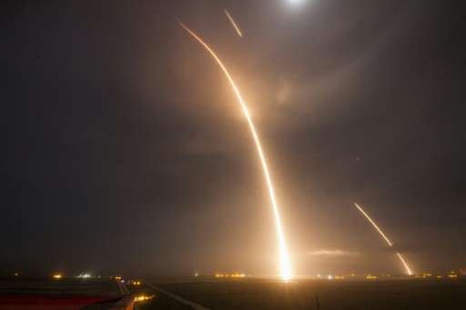 This 9-minute time exposure shows the launch re-entry and landing burns of the SpaceX Falcon 9 rocket which successfully land