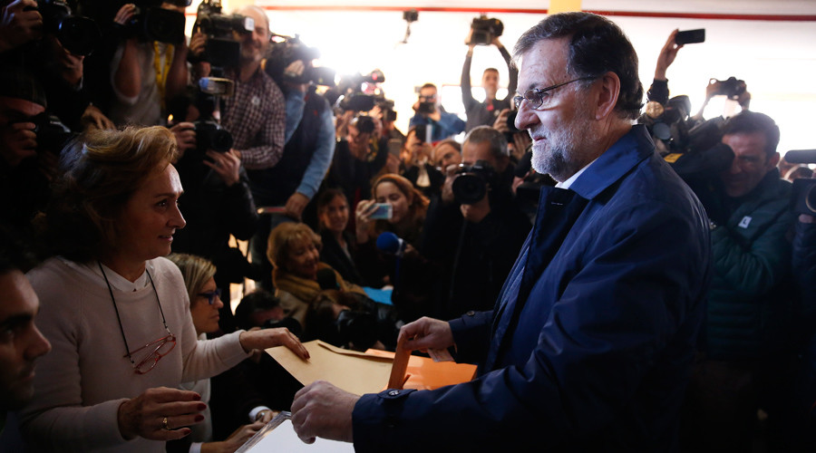 Spain's Prime Minister and Popular Party candidate Mariano Rajoy casts his vote in Spain's general election in Madrid Spain