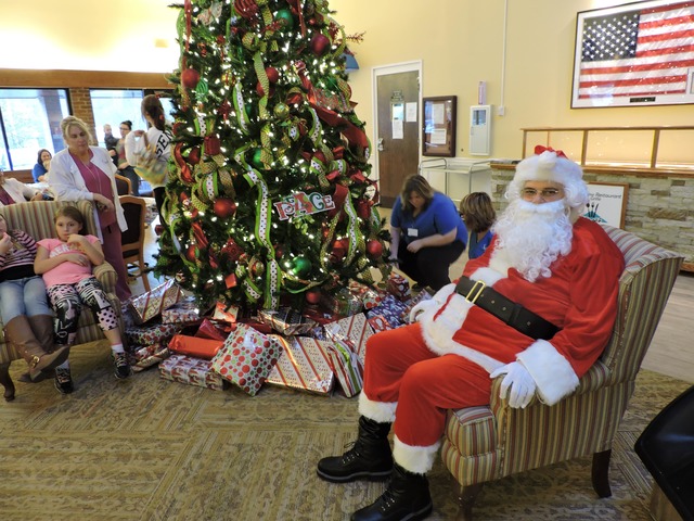 Staff and guests celebrated their annual Care Partners Kids Christmas Celebration Wednesday with a visit from Santa Claus