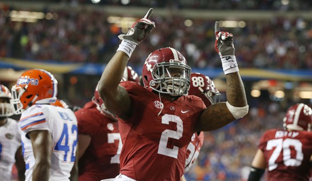 Dec 5 2015 Atlanta GA USA Alabama Crimson Tide running back Derrick Henry celebrates his 2 yard touchdown run in the second quarter against the Florida Gators in the 2015 SEC Championship Game at the Georgia Dome. Mandatory Credit Butch Dill-USA