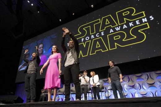 Star Wars The Force Awakens cast members Oscar Isaac Daisy Ridley John Boyega writer director and producer J.J. Abrams