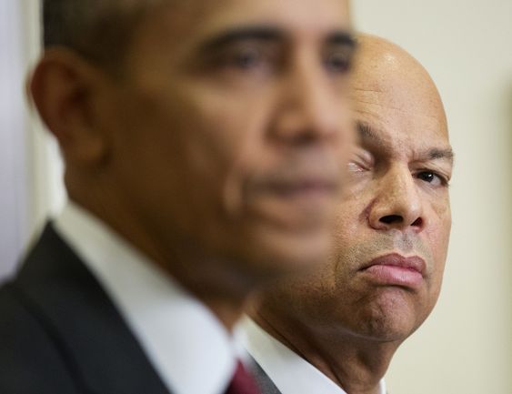 Jeh Johnson listens at right as President Barack Obama speaks in the Roosevelt Room of the White House in Washington Wednesday Nov. 25 2015. Obama briefed the public on the nation's homeland security posture heading