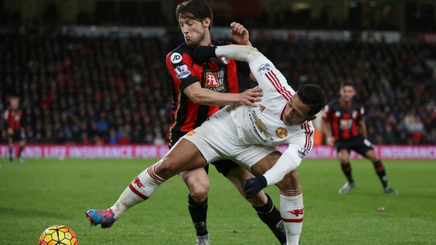 Harry Arter and Memphis Depay compete for the ball in Bournemouth's 2-1 win over Manchester United