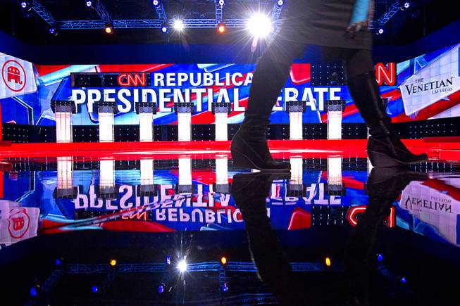 Steve Marcus A woman walks across the stage for the CNN Republican Presidential Debate on Tuesday Dec. 15 2015 at the Venetian theater