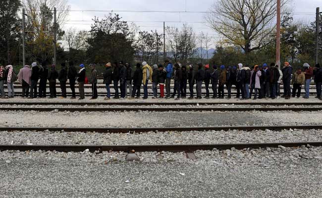 European Union Presses Greece over Migrants Weighs Schengen Threat